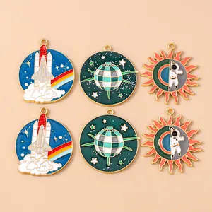 Detail view of 6 colorful enamel space-themed charms for DIY jewelry making