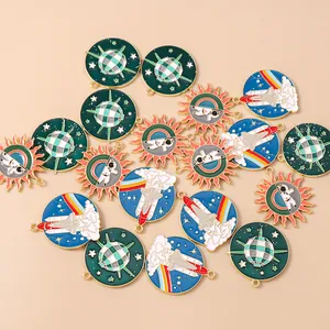 Macro detail of enamel space charms featuring astronaut and rocket designs for DIY jewelry