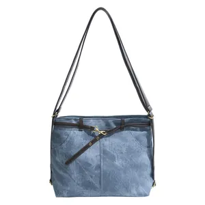 Vintage large capacity blue canvas tote bag with brown leather straps and metal hook