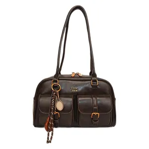 Vintage dark brown Boston shoulder bag with dual front pockets and racket charm detail
