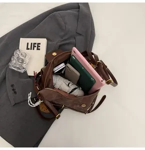 Interior view of large capacity matte tote showing space for tablet and essentials