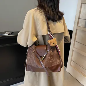Dark brown matte patchwork tote bag for women with cute teddy bear charm on shoulder strap