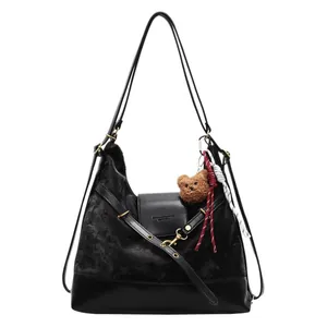 Large black matte velvet tote bag with leather patchwork and adjustable gold straps