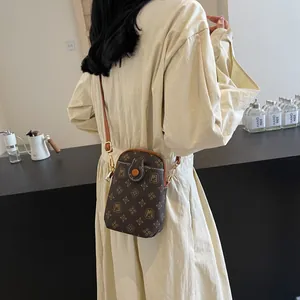 Retro monogram mini crossbody phone bag for women with adjustable brown leather strap