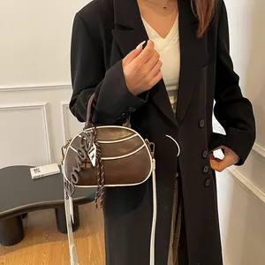 Retro brown baseball style crossbody bag with Bonny letter charm and contrast stitching