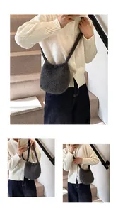 Détail du sac à bandoulière en peluche gris foncé avec texture douce et lanière assortie