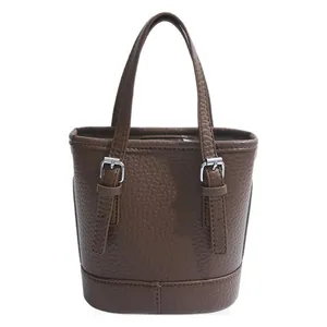 Minimalist deep brown bucket tote bag with lychee texture and silver metal buckles