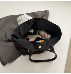Top view of large tote bag showing interior magnetic clasp and spacious storage capacity