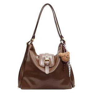Deep brown retro large capacity shoulder bag with bear charm and silk scarf detail