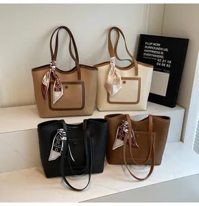 Minimalist tote bags in four colors with printed silk scarves and front pocket details