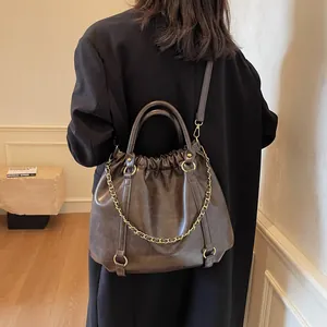 Retro pleated dark brown PU leather crossbody bag with dual ring handles and chain strap