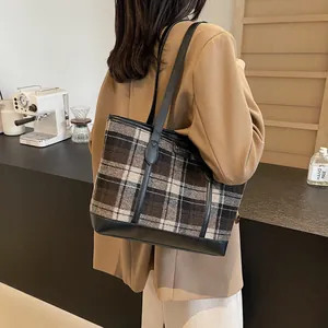 Retro plaid tote bag with brown checkered fabric and black leather straps for women