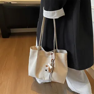 Sac cabas en toile beige avec broderie 'But Time going on' et charme de chien