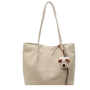 Sac cabas en toile blanc cassé avec broderie et pendentif mignon en forme de chiot