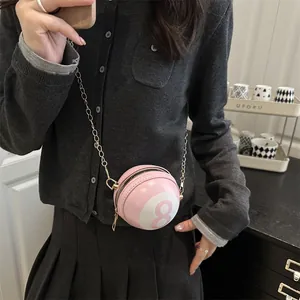 Pink billiard 8-ball round crossbody bag with gold chain strap for women