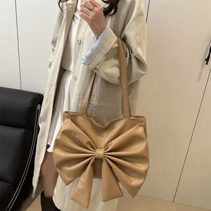 Elegante borsa tote kaki da donna con un grande fiocco decorativo e sottili spalline lunghe