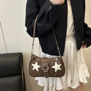 Brown leather handbag with white star appliques and silver star buckle crossbody bag