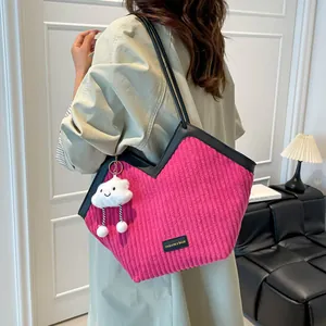 Rose pink corduroy shoulder tote bag with black leather trim and white cloud charm