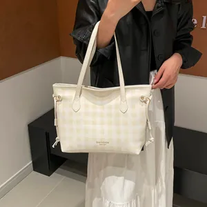 Chic beige checkered tote bag with drawstring detail and leather straps for women