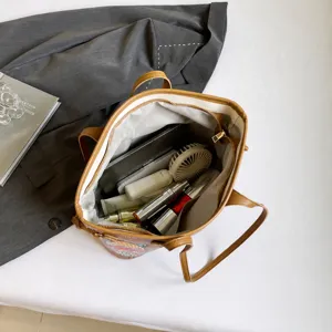Interior view of the brown bear graffiti tote bag showing large capacity for essentials