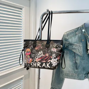 Black graffiti tote bag with bear print and sturdy synthetic leather shoulder straps