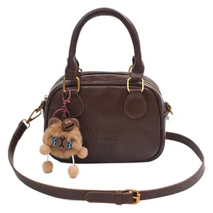 Retro brown small square handbag with lucky embossing and cute teddy bear charm