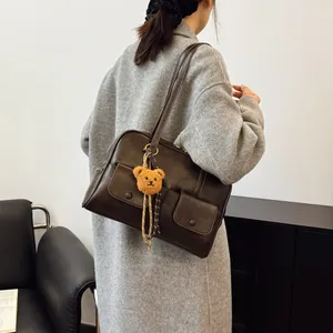 Vintage dark brown faux leather shoulder bag with pockets and cute bear charm
