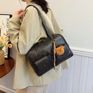 Retro black faux leather shoulder bag with pockets and cute bear charm for women