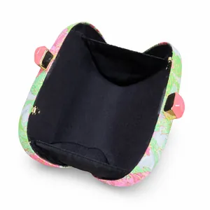 Internal view of the floral evening clutch bag showing black lining and pocket