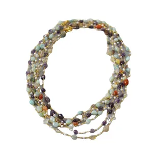 Layered gold chain sweater necklace with colorful natural stones and pearls