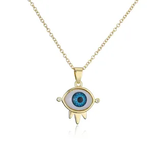 Bohemian gold 18K plated evil eye pendant necklace with blue iris and drop charms
