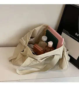 Interior view of spacious sports yoga bag showing tablet and water bottle storage
