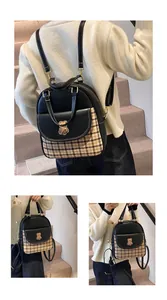 Detailed views of checkered backpack with golden bear logo and contrast stitching