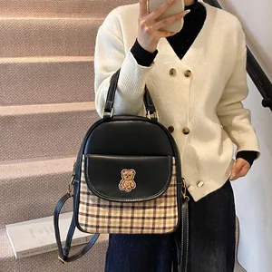 Fashionable black leather and plaid backpack with cute embroidered bear for women