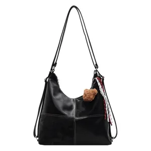 Retro black large capacity tote bag with white contrast stitching and plush bear charm