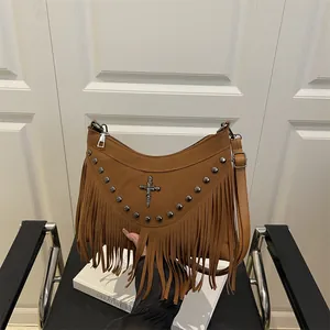 Vintage brown suede handbag with trendy rivets, long tassels and gothic cross decoration