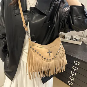 Fashionable camel suede crossbody bag with tassels and studs for women in fall 2025