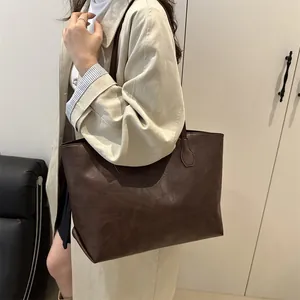Large dark brown faux leather tote bag with vintage texture for daily office commuting