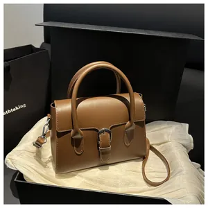 Brown leather handbag in gift box with silver buckle and removable strap detail