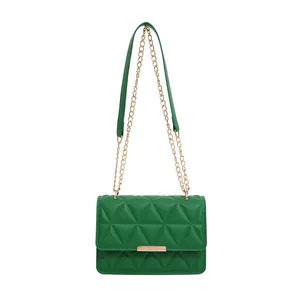 Quilted emerald green square handbag with gold chain strap and metallic clasp closure