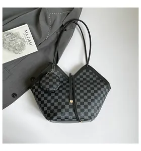 Detailed top view of a grey checkered tote bag with a matching mini round coin purse