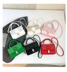 Collection of chic flap crossbody bags in six vibrant colors with metallic turn-lock closure
