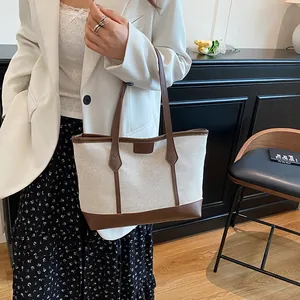 Chic beige canvas and brown leather contrast tote bag for office and casual wear