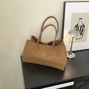 Brown suede tote bag for women with long handles for minimalist commute look
