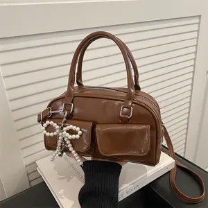 Vintage brown PU leather Boston handbag with pearl bow charm and shoulder strap