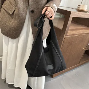 Minimalist black large canvas tote bag with leather patchwork for women style