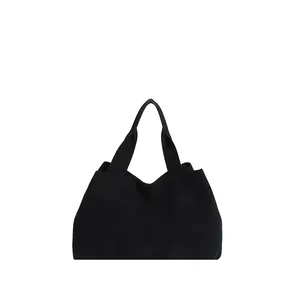 Minimalist black felt bucket tote bag with dual handles and soft matte finish