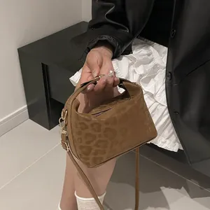 Chic leopard print handbag for women with handle and gold hardware crossbody strap