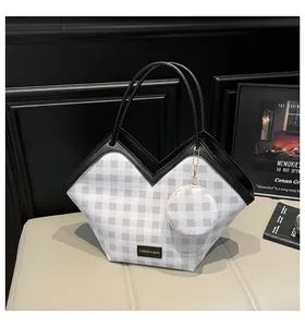 Detail of plaid tote bag with checkered pattern, V-cut top and small round coin purse