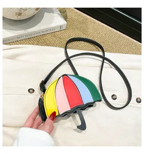 Detailed view of creative rainbow umbrella crossbody bag with colorful patchwork PU leather
